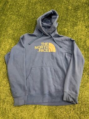 The North Face Blue Hoodie with Yellow Logo